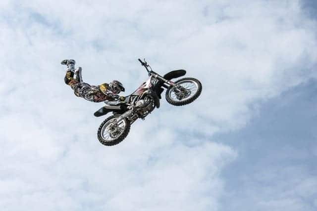 Daredevil Leadership, person doing death-defying tricks on a motorbike